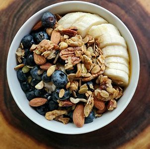 healthy housemade organic granola with yogurt and honey at healthy farm to table cafe in TX