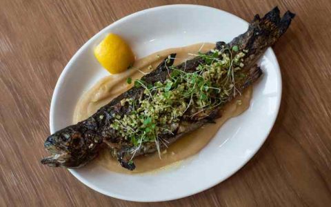 Healthy fish at Apple Blossom Denver, a farm-to-table restaurant showcasing Colorado farmers and purveyors