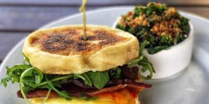 Sustainable and healthy breakfast sandwich and kale salad, all locally-sourced at The Grove Cafe in Albuquerque, NM.